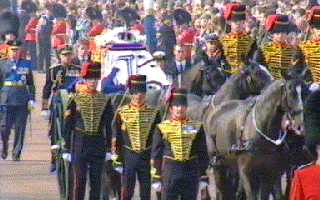 The coffin carried on a gun carriage