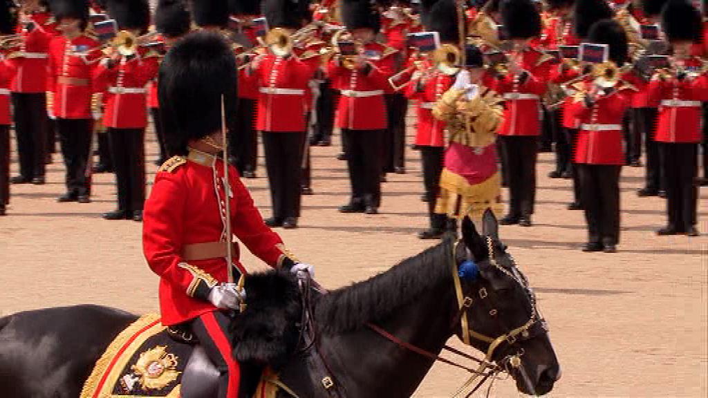 The Adjutant brings up the rear of the march past