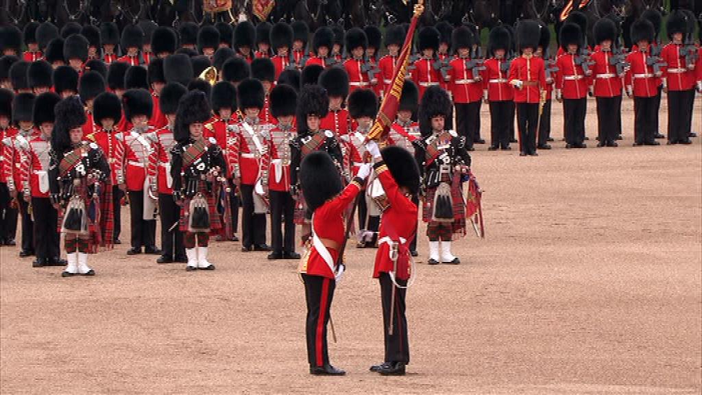 The Ensign receives the Colour