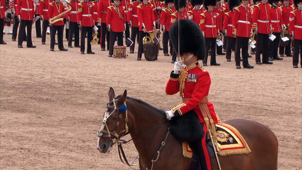 The Field Officer salutes The Queen